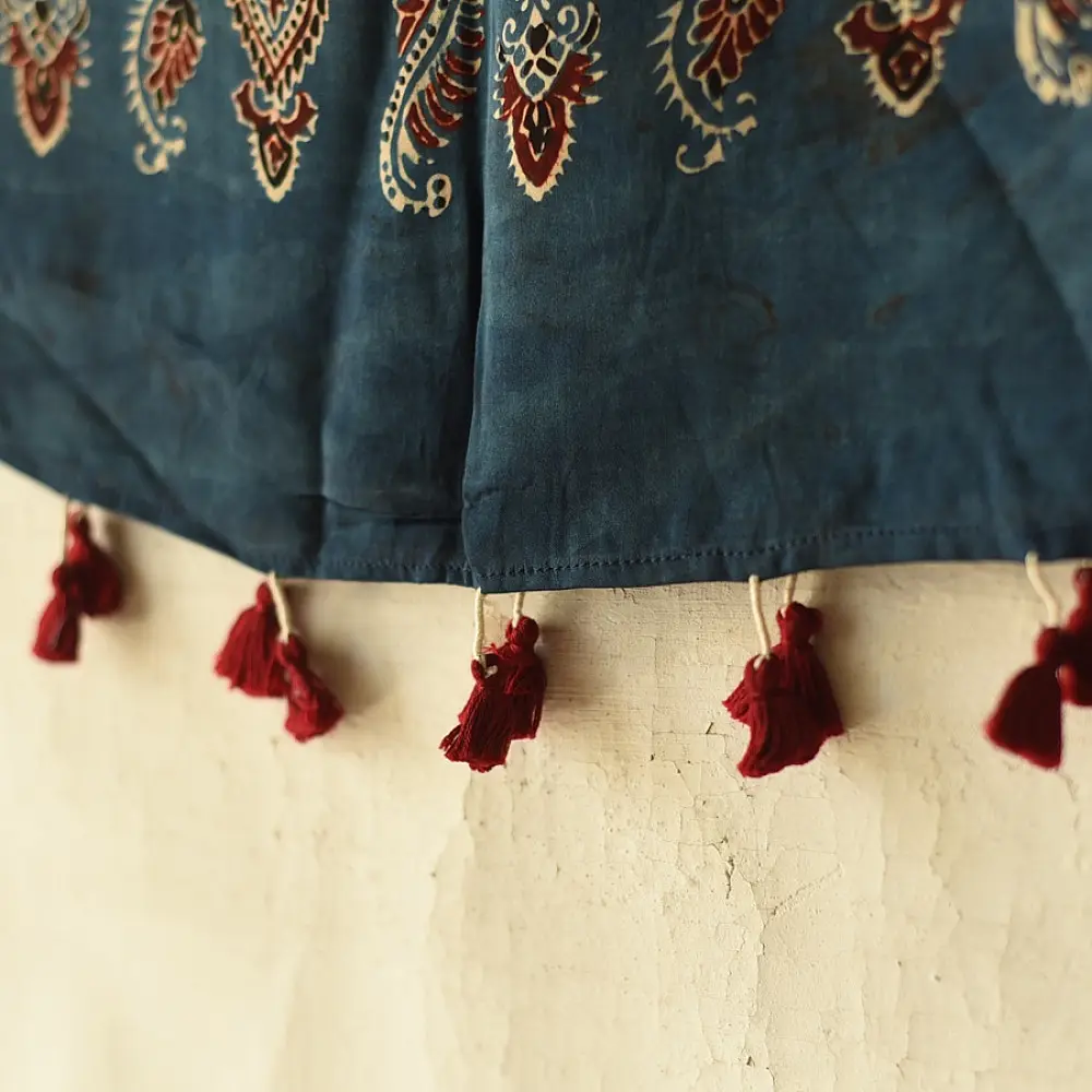 deep indigo blue madder red ajrakh modal silk dupatta hand block printed floral medallion jaal body ornate cross-lattice pallu traditional mihrab arched detail wedding festive wear sustainable luxury natural dyed with tassels