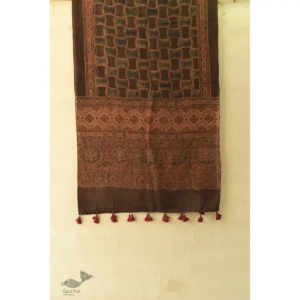 chocolate brown madder red ajrakh wool stole hand block printed geometric grid body ornate floral mandala border traditional artisanal winter scarf sustainable wool natural dyed with tassels