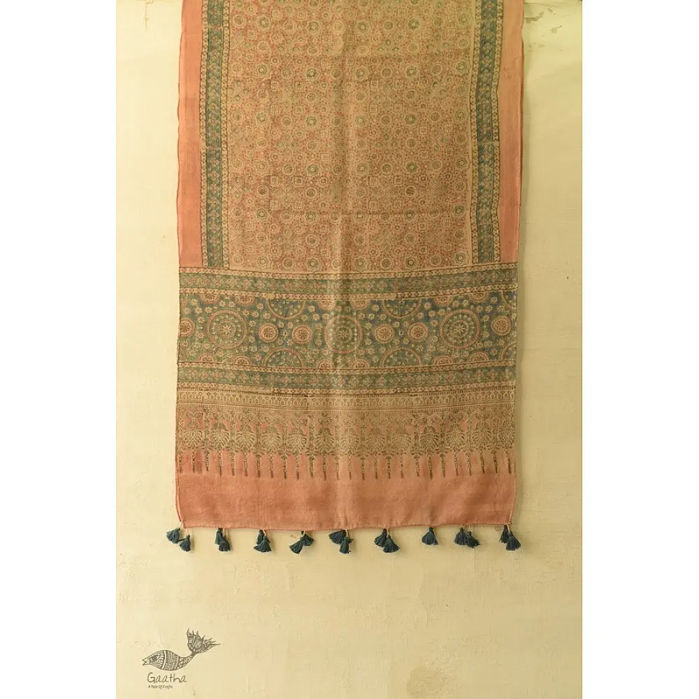 soft peach moss green ajrakh wool stole hand block printed jhar floral sprig body ornate circular medallion border traditional artisanal winter scarf sustainable wool natural dyed with tassels