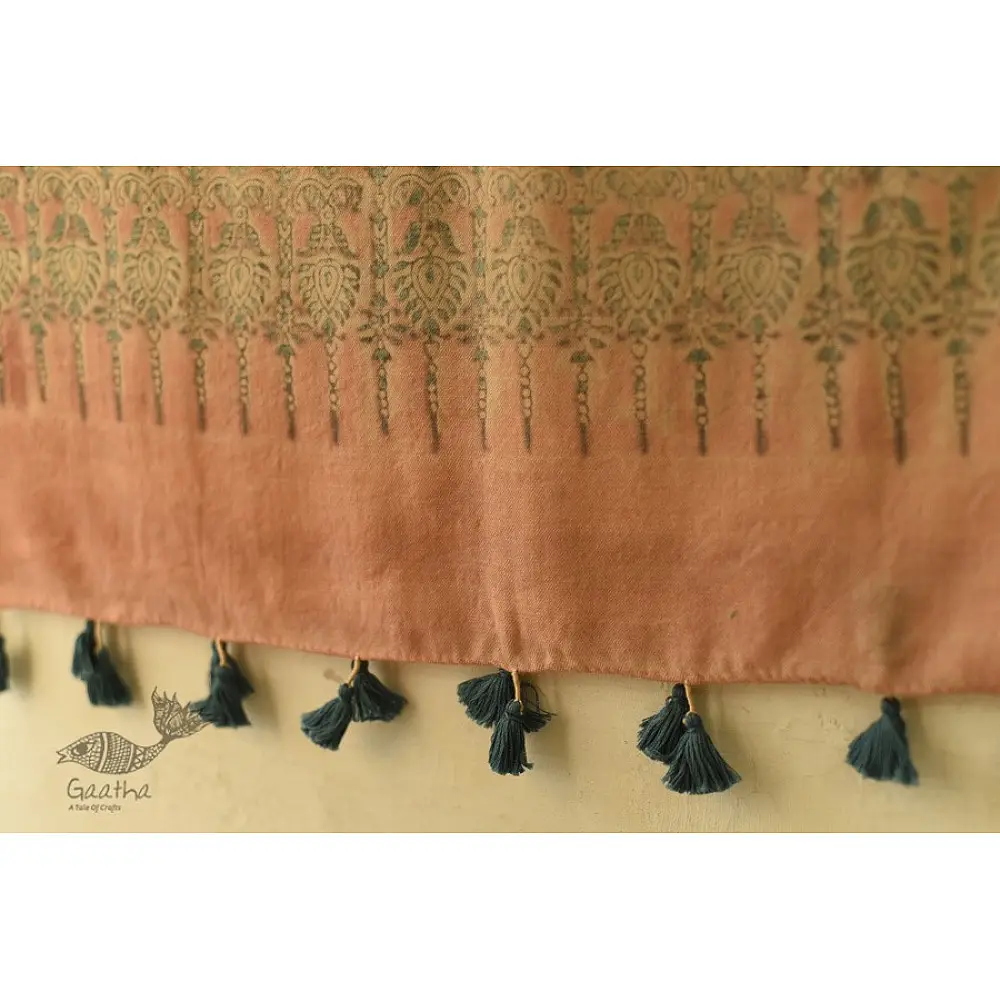 soft peach moss green ajrakh wool stole hand block printed jhar floral sprig body ornate circular medallion border traditional artisanal winter scarf sustainable wool natural dyed with tassels