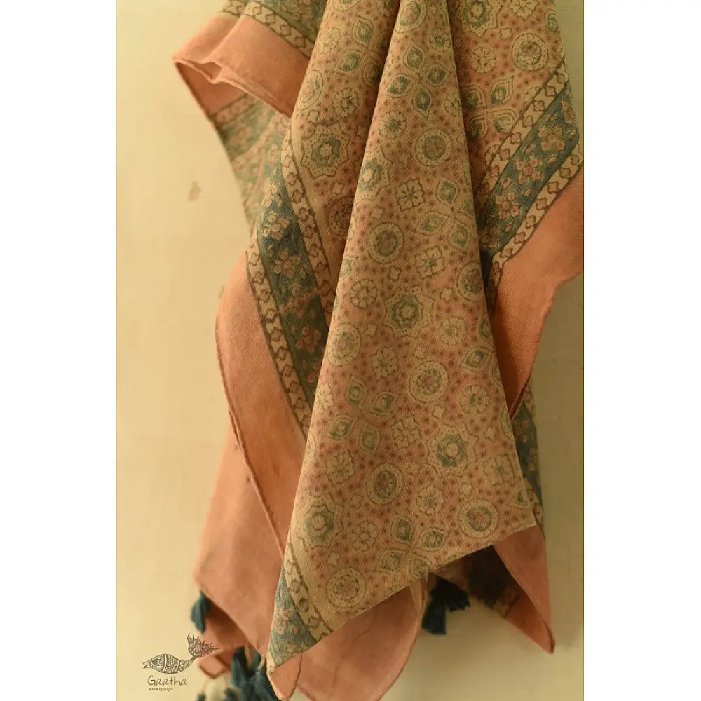 soft peach moss green ajrakh wool stole hand block printed jhar floral sprig body ornate circular medallion border traditional artisanal winter scarf sustainable wool natural dyed with tassels