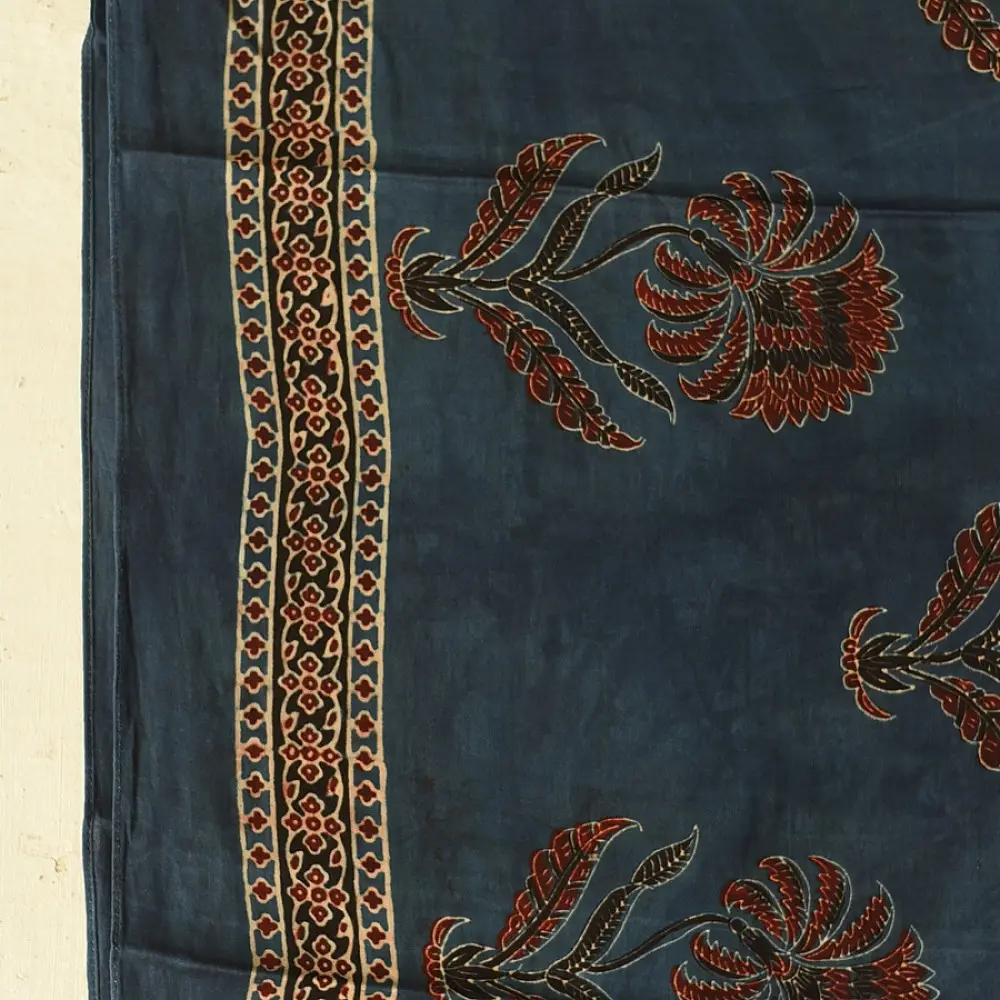 deep indigo blue madder red ajrakh silk stole hand block printed floral buta motif body ornate star medallion border traditional mihrab arched detail artisanal scarf sustainable fashion natural dyed with tassels