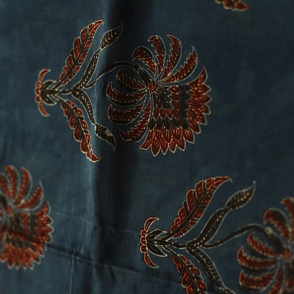 deep indigo blue madder red ajrakh silk stole hand block printed floral buta motif body ornate star medallion border traditional mihrab arched detail artisanal scarf sustainable fashion natural dyed with tassels