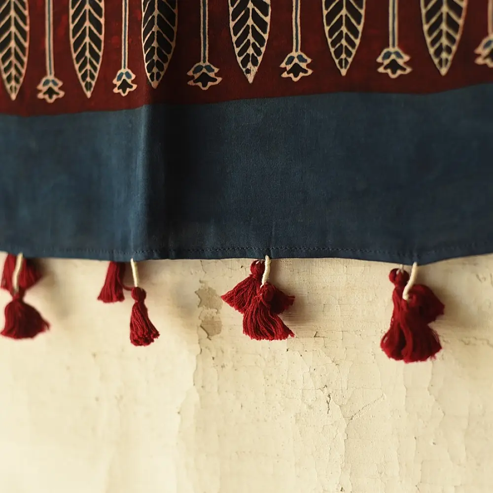 deep indigo blue madder red ajrakh silk stole hand block printed floral buta motif body ornate star medallion border traditional mihrab arched detail artisanal scarf sustainable fashion natural dyed with tassels