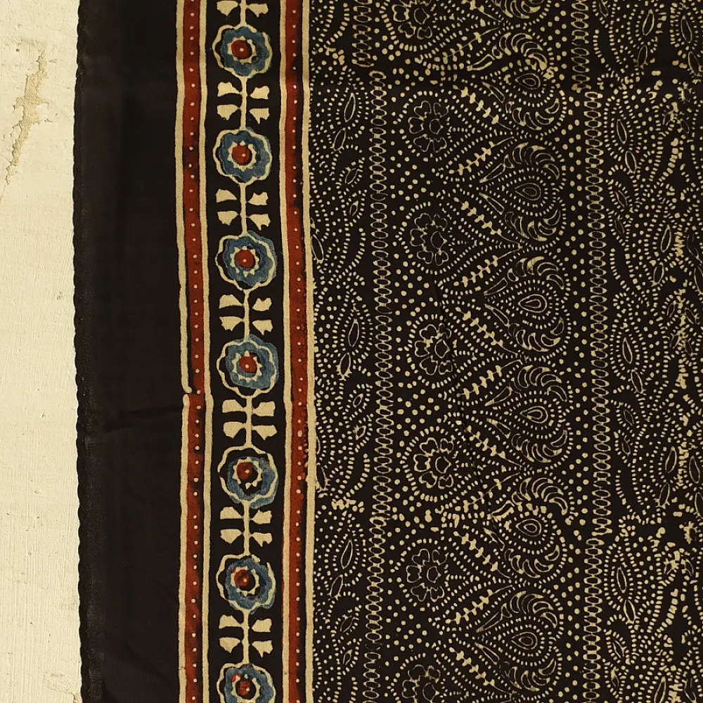 black gold ajrakh cotton stole hand block printed bundi tiny dot body ornate circular mandala border traditional mihrab arched detail artisanal scarf sustainable fashion natural dyed with tassels