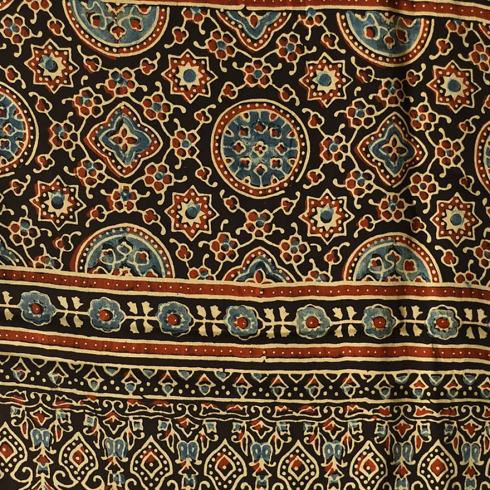 black gold ajrakh cotton stole hand block printed bundi tiny dot body ornate circular mandala border traditional mihrab arched detail artisanal scarf sustainable fashion natural dyed with tassels