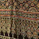 black gold ajrakh cotton stole hand block printed bundi tiny dot body ornate circular mandala border traditional mihrab arched detail artisanal scarf sustainable fashion natural dyed with tassels