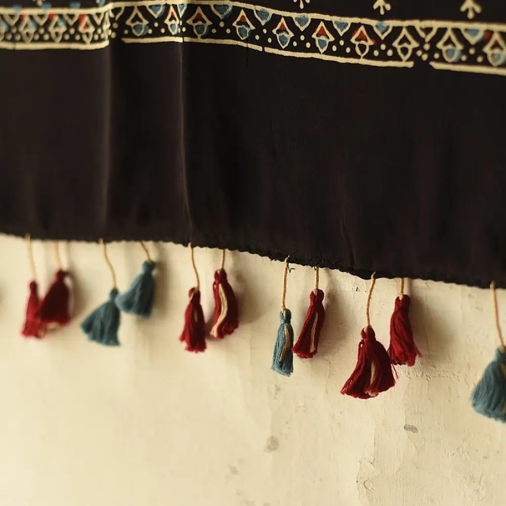 black gold ajrakh cotton stole hand block printed bundi tiny dot body ornate circular mandala border traditional mihrab arched detail artisanal scarf sustainable fashion natural dyed with tassels