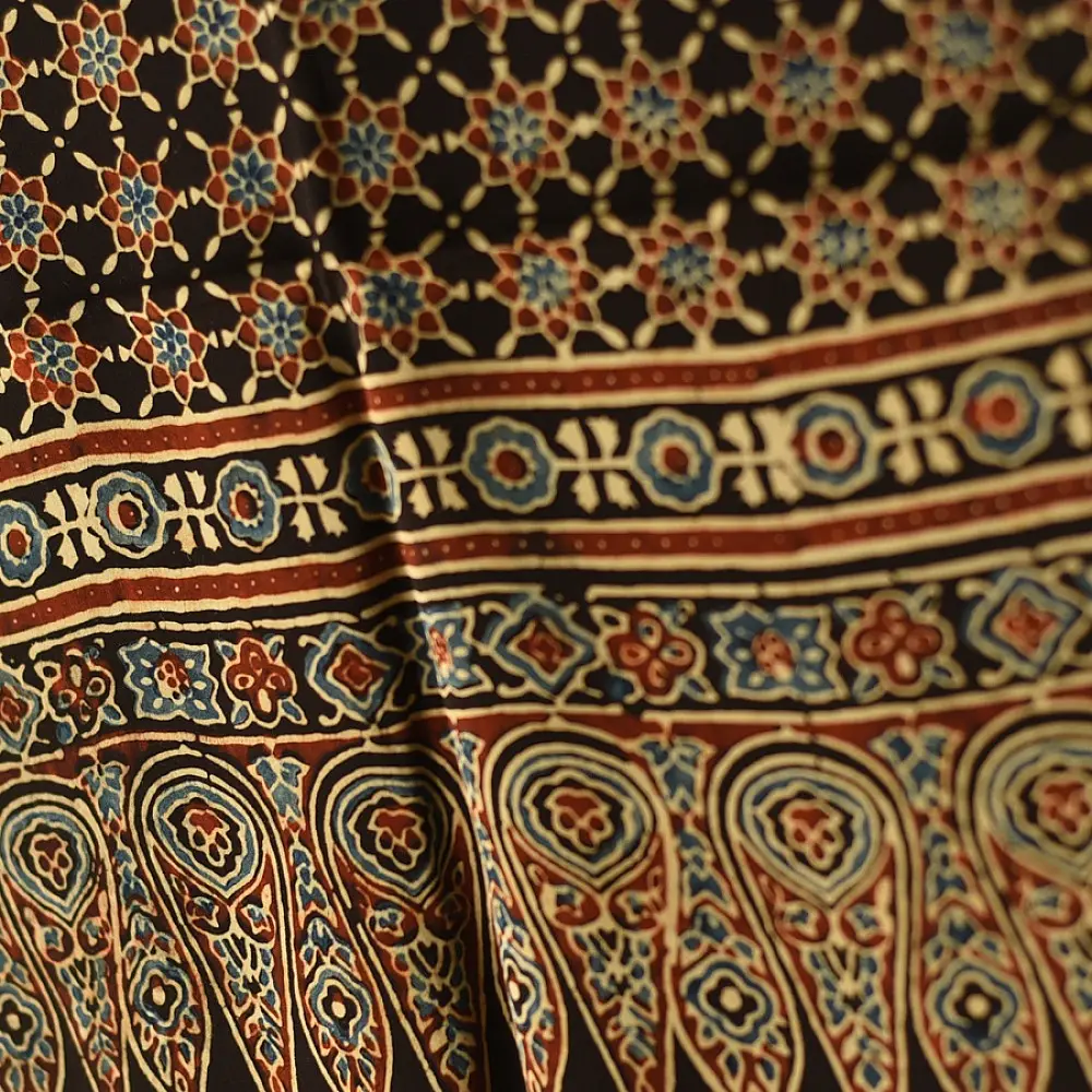 black gold ajrakh modal silk dupatta hand block printed large chand moon medallion bundi dot jaal body ornate eight-pointed star pallu traditional mihrab arched detail wedding festive wear sustainable luxury natural dyed with tassels