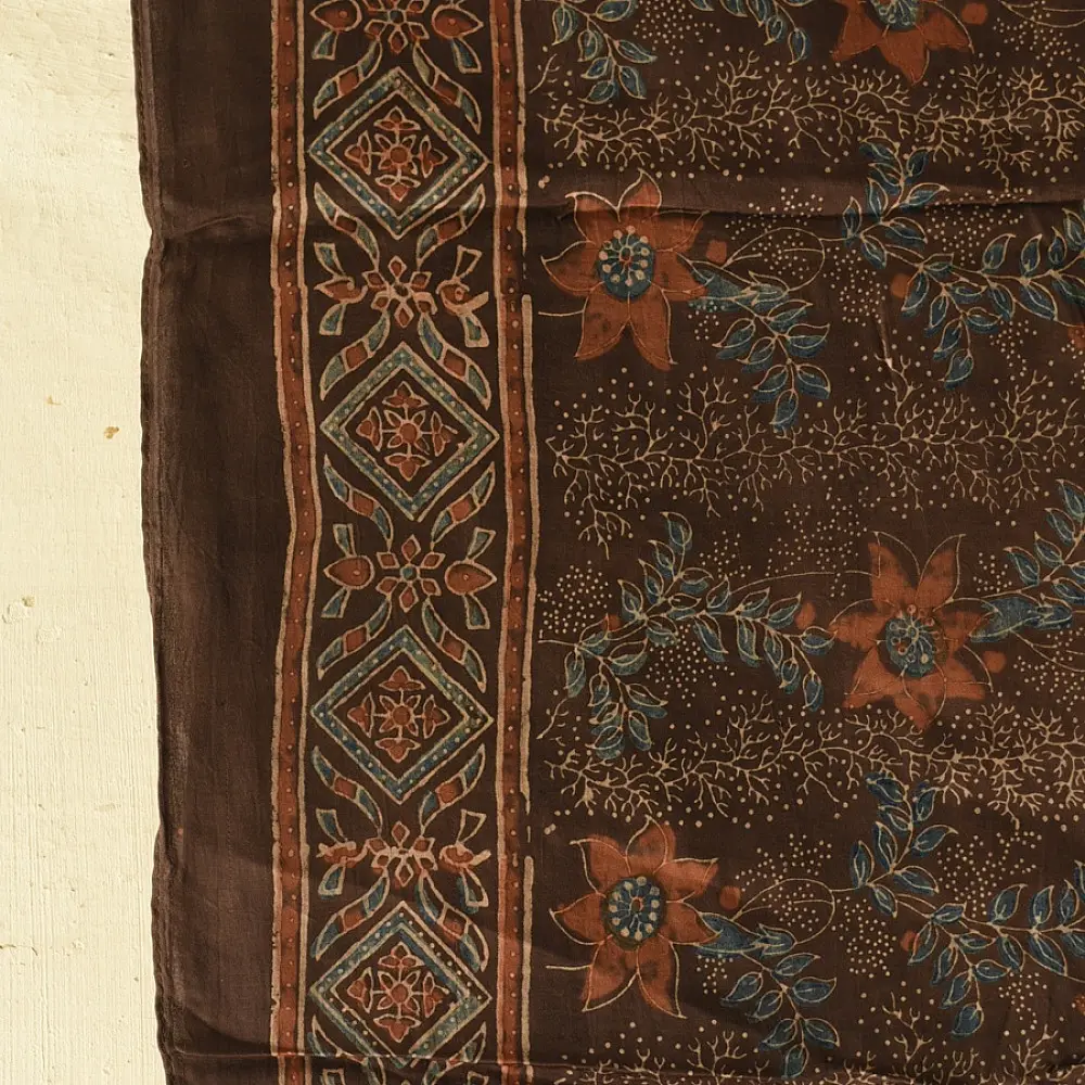 chocolate brown indigo madder red ajrakh modal silk dupatta hand block printed floral vine jaal body ornate geometric lozenge pallu traditional mihrab arched detail wedding festive wear sustainable luxury natural dyed with tassels