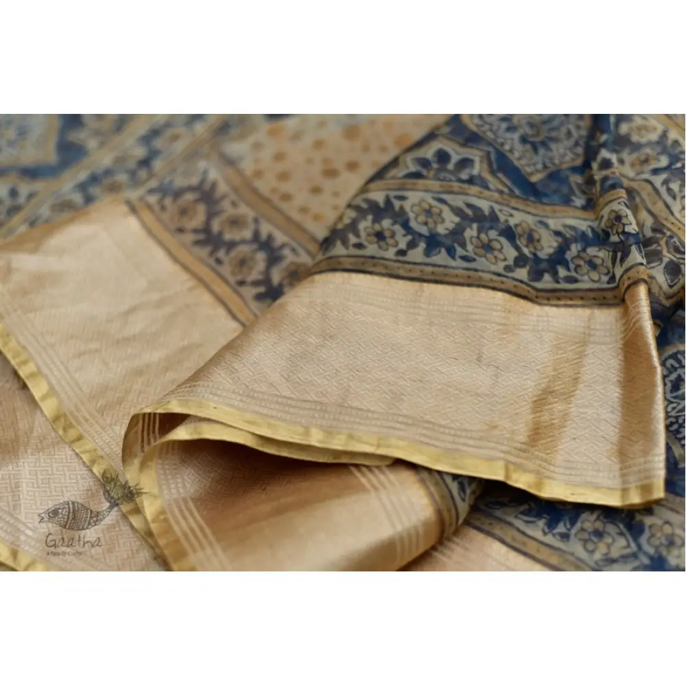 Organza ajrakh printed saree with zari border