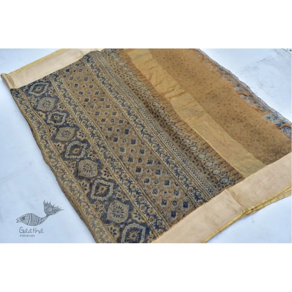 Organza ajrakh printed saree with zari border