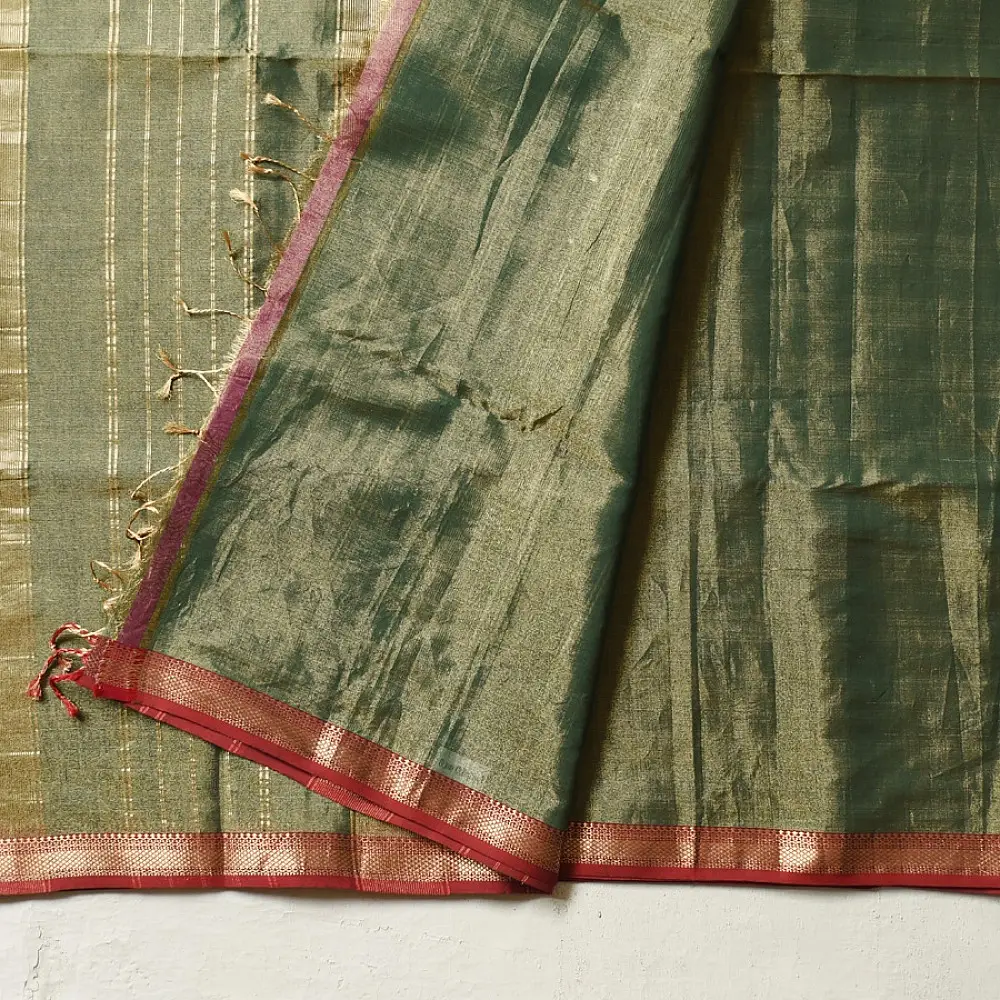 sage green handloom maheshwari tissue silk cotton saree with broad golden zari panels and red borders for women