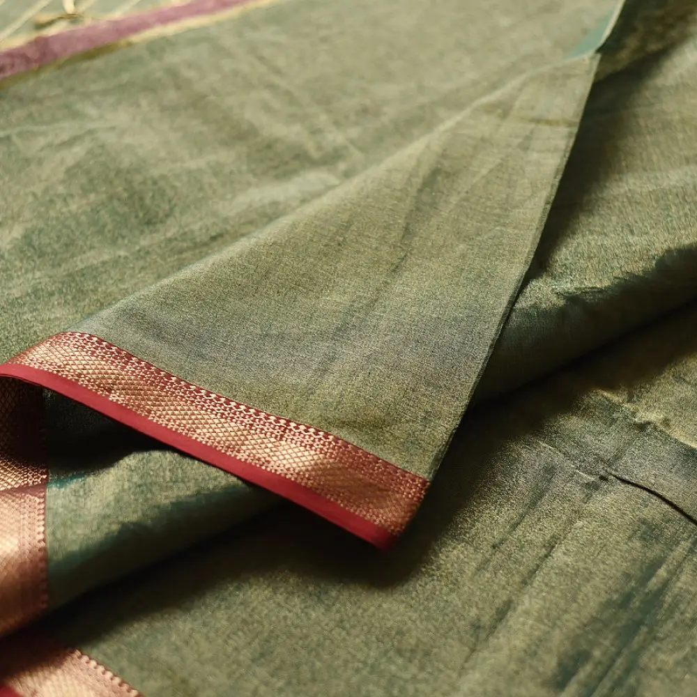sage green handloom maheshwari tissue silk cotton saree with broad golden zari panels and red borders for women