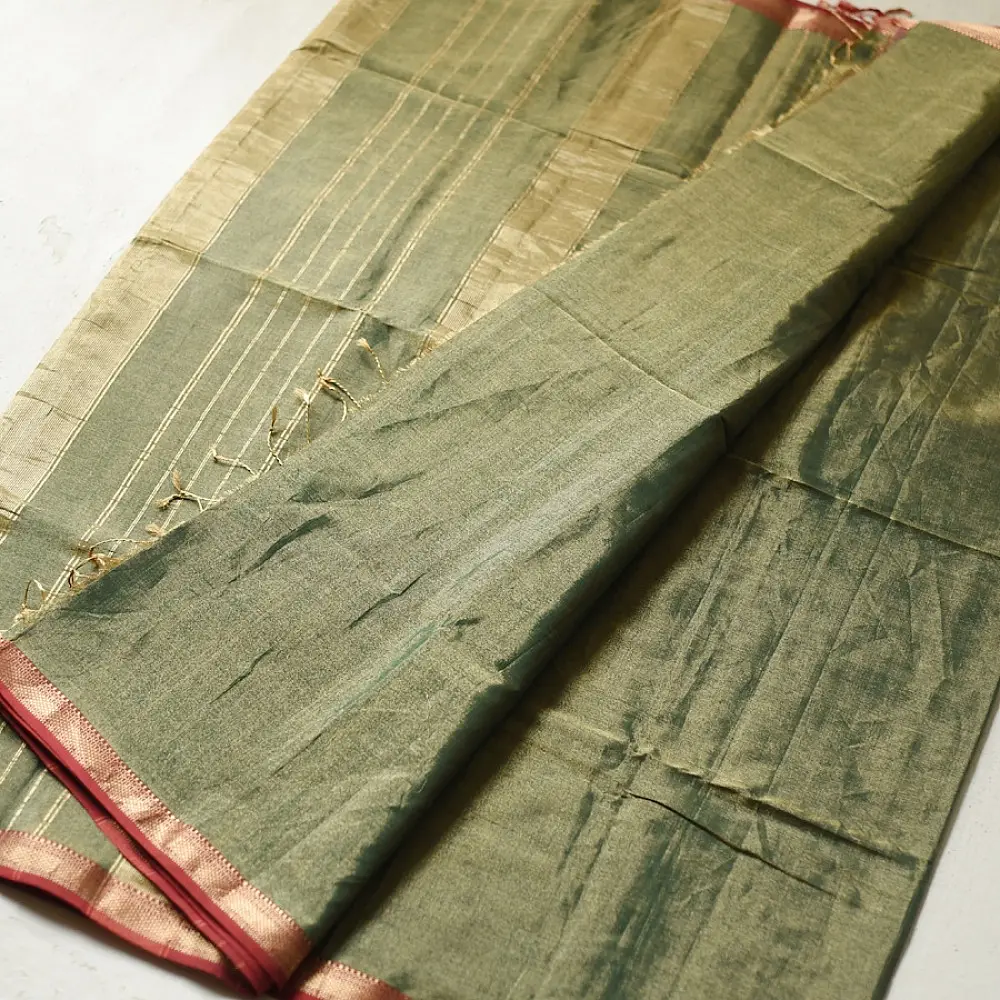 sage green handloom maheshwari tissue silk cotton saree with broad golden zari panels and red borders for women
