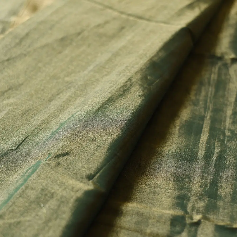 sage green handloom maheshwari tissue silk cotton saree with broad golden zari panels and red borders for women