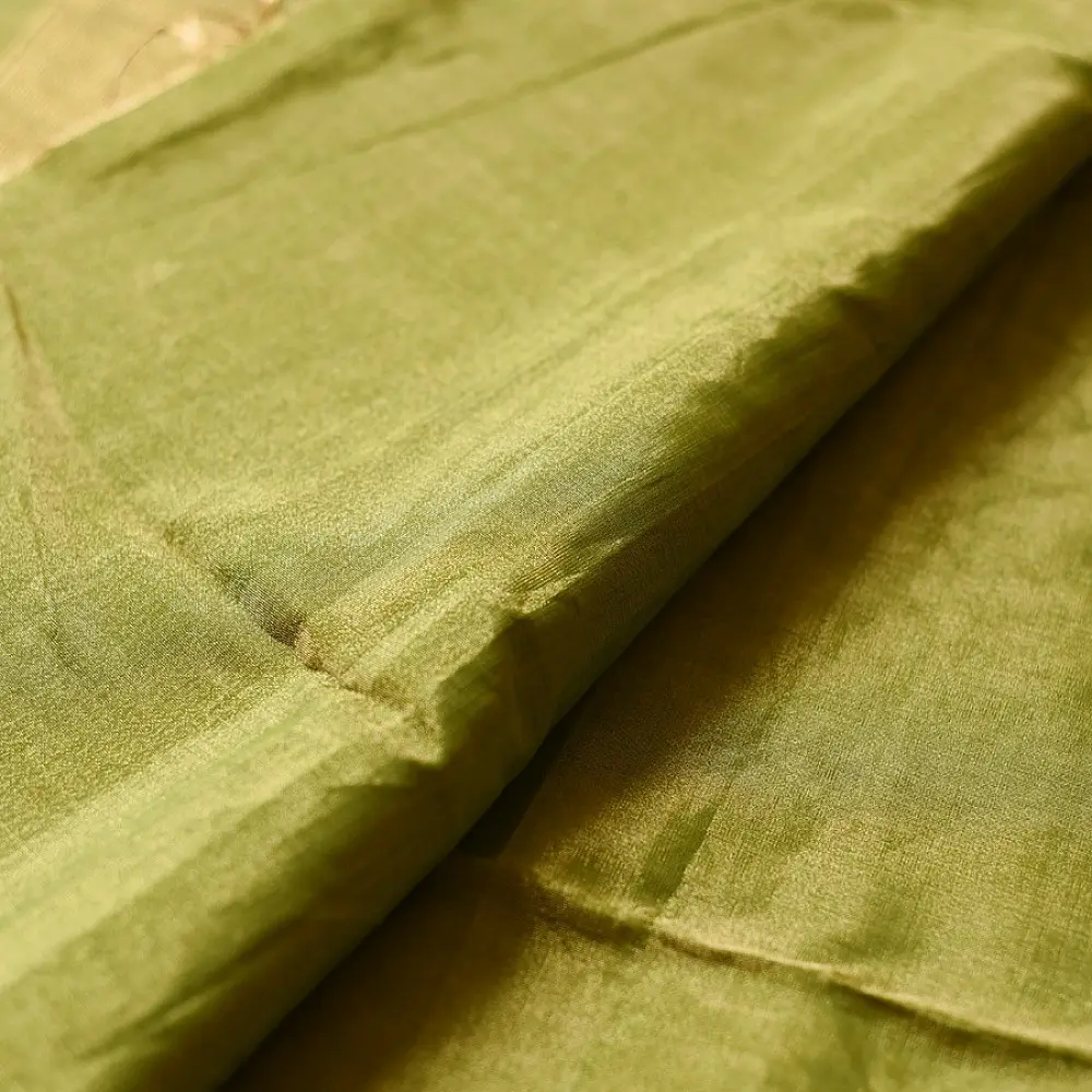 leaf green and gold handloom maheshwari tissue silk cotton saree with fine striped body and red borders for women