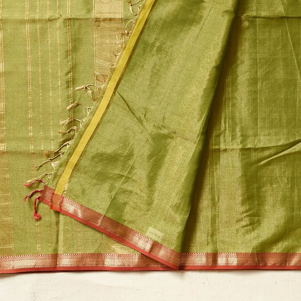 leaf green and gold handloom maheshwari tissue silk cotton saree with fine striped body and red borders for women