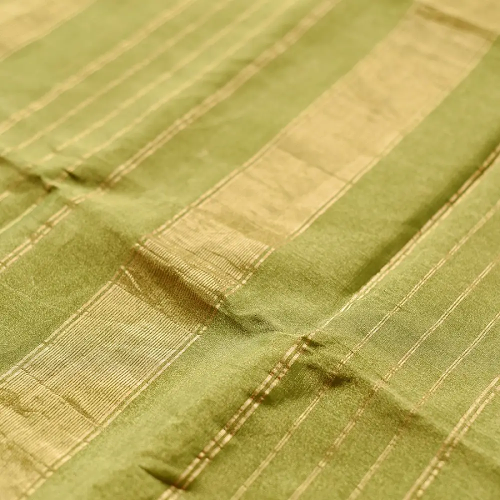 leaf green and gold handloom maheshwari tissue silk cotton saree with fine striped body and red borders for women