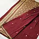 maroon red handloom traditional assam cotton saree with small gold star butta motifs and triangular border weaves for women
