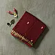 maroon red handloom traditional assam cotton saree with small gold star butta motifs and triangular border weaves for women