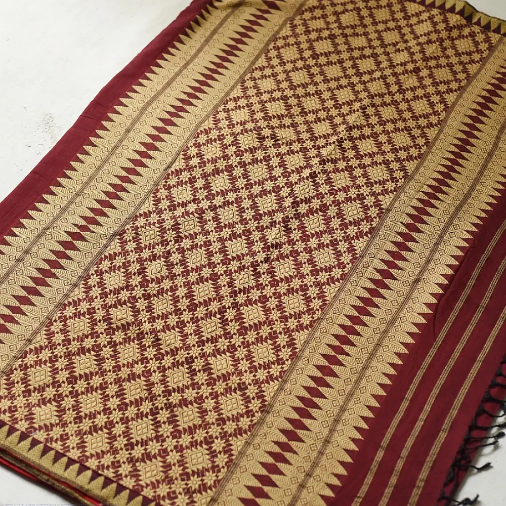 maroon red handloom traditional assam cotton saree with small gold star butta motifs and triangular border weaves for women