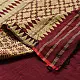 maroon red handloom traditional assam cotton saree with small gold star butta motifs and triangular border weaves for women