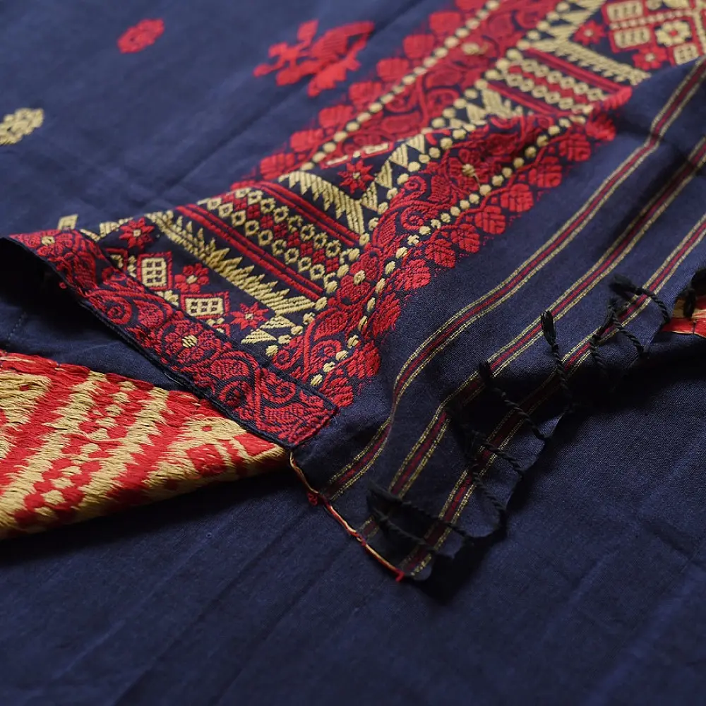 navy blue handloom traditional assam cotton saree with small red and gold butta motifs and woven red borders for women