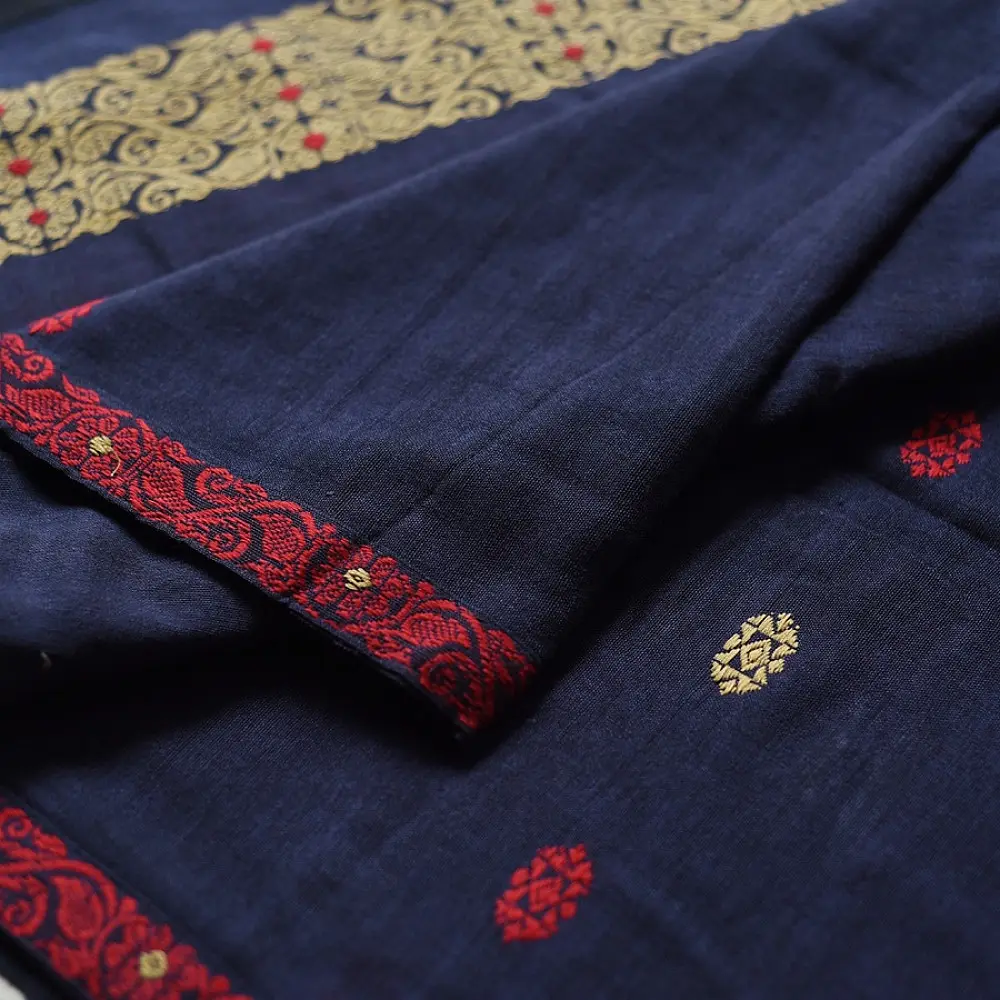 navy blue handloom traditional assam cotton saree with small red and gold butta motifs and woven red borders for women