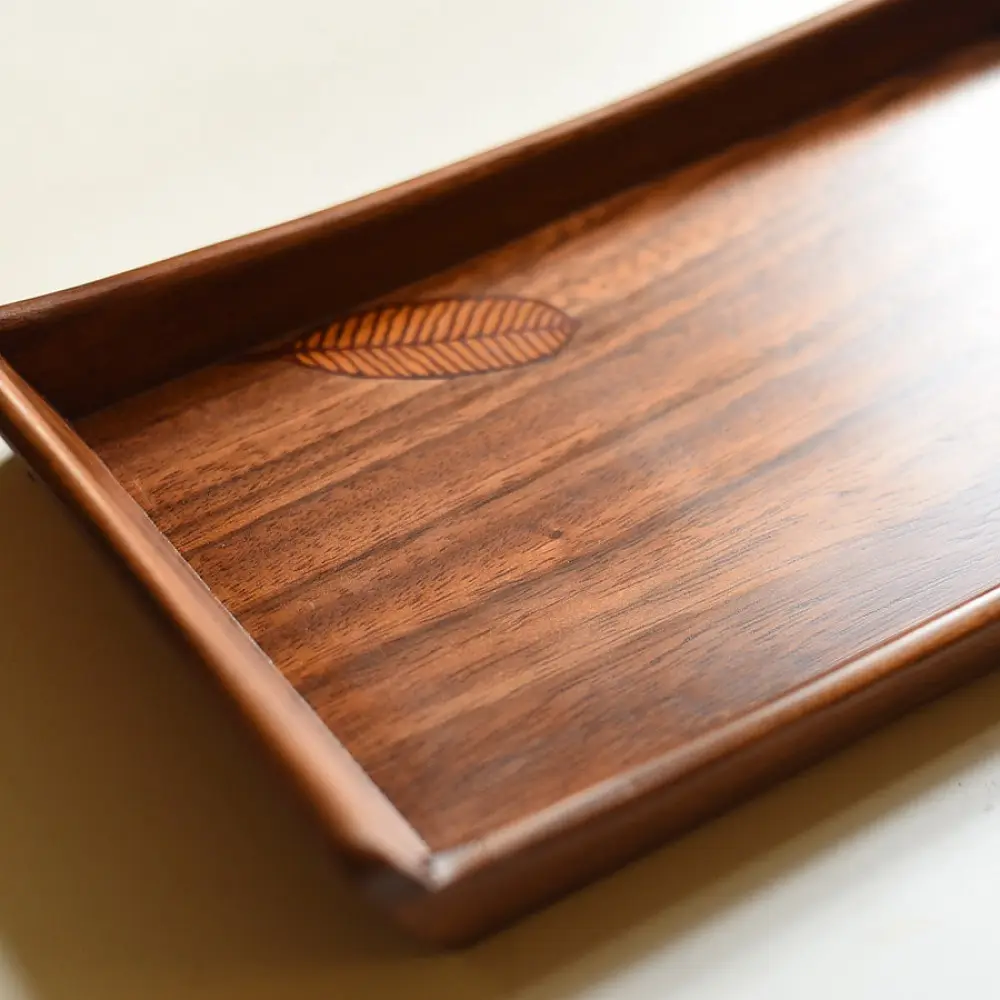 handmade wooden serving tray with leaf inlay design