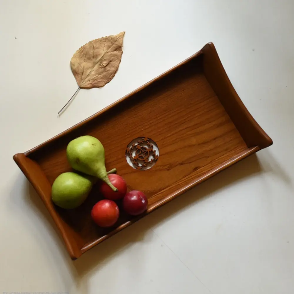 handmade wooden serving tray with carved geometric center design