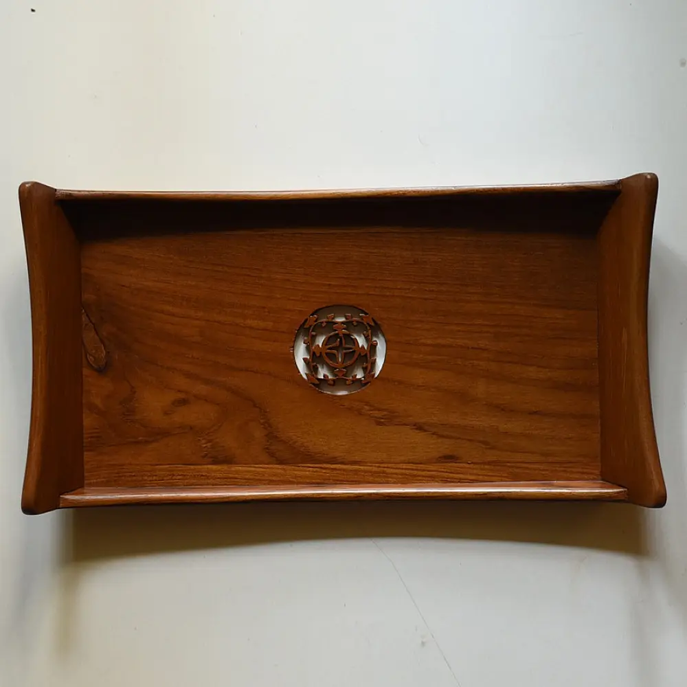 handmade wooden serving tray with carved geometric center design