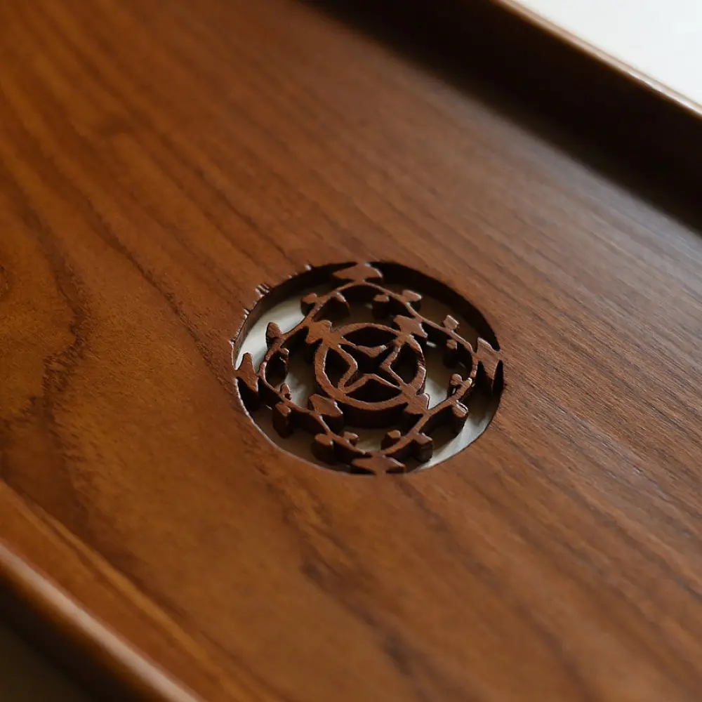 handmade wooden serving tray with carved geometric center design