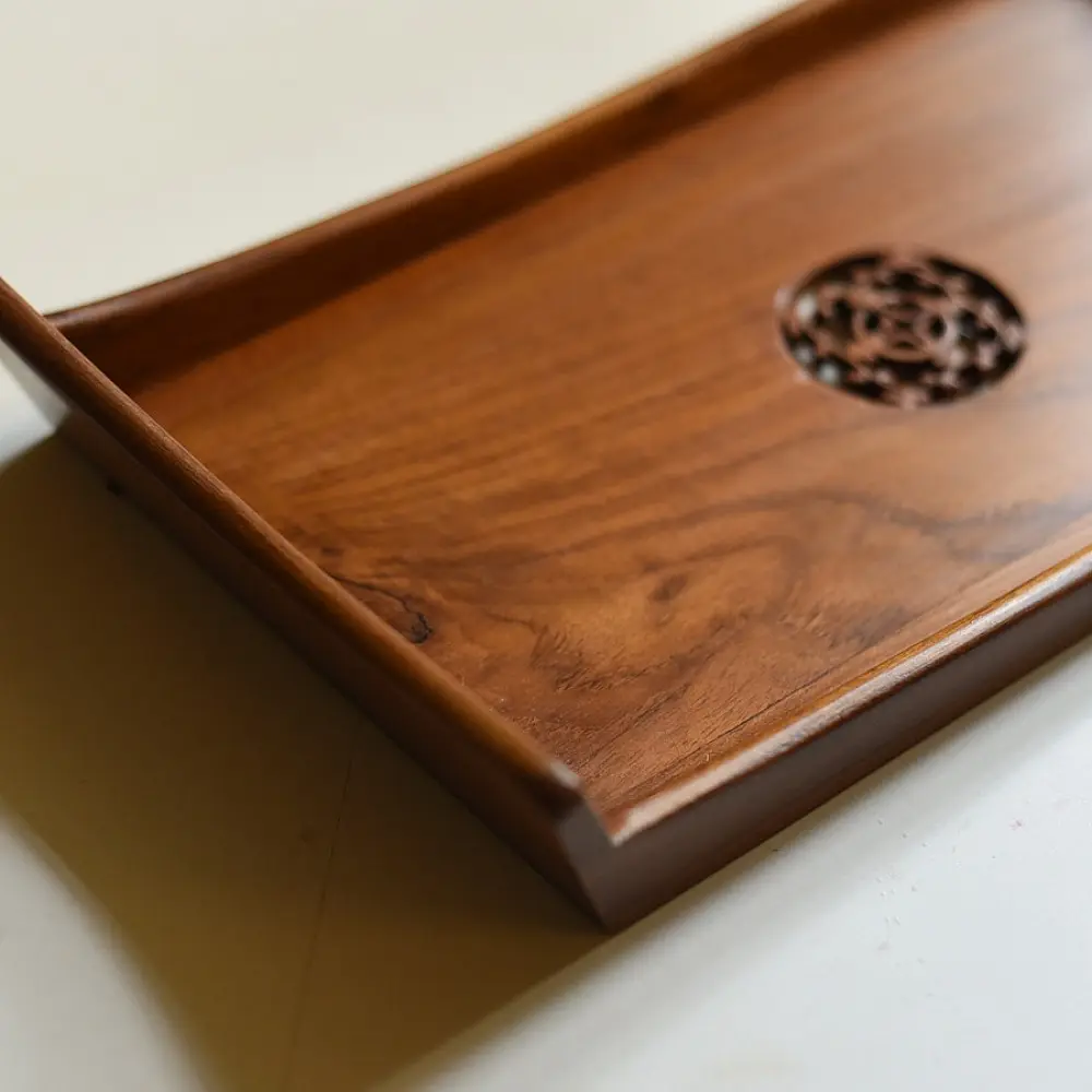 handmade wooden serving tray with carved geometric center design