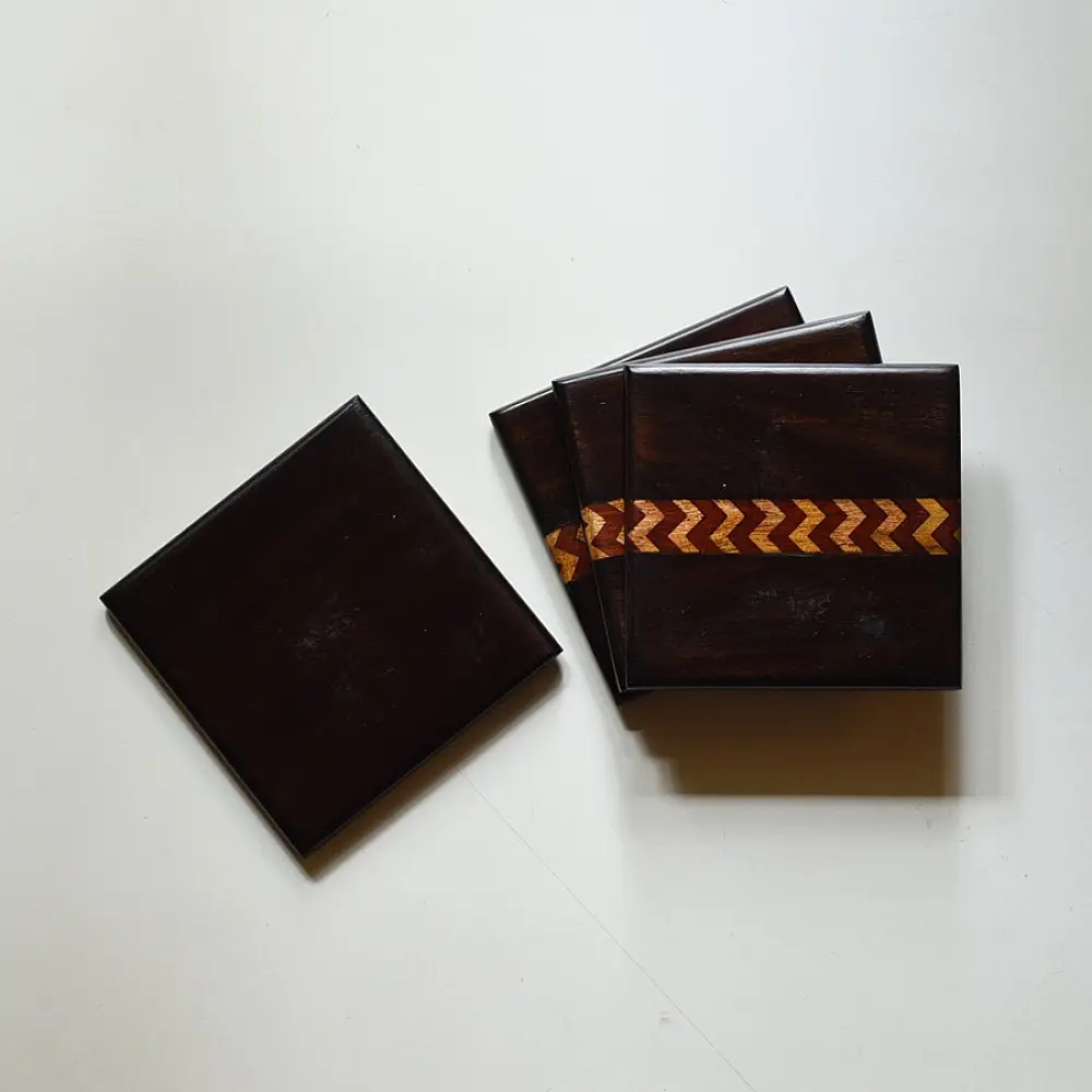 handmade dark wood coasters set of four with zigzag wooden inlay design