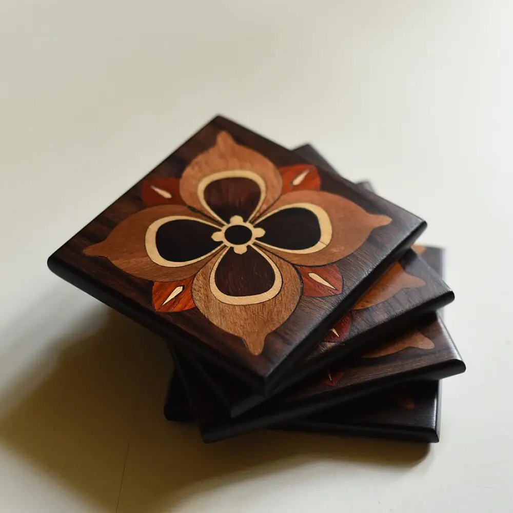 handmade dark wood coasters set of four with four petal flower wooden inlay design