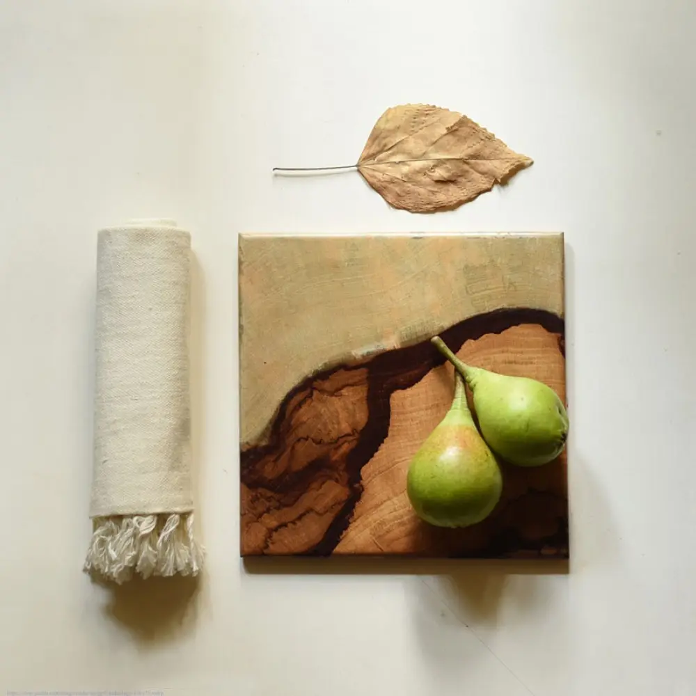 handmade wooden trivet with natural grain pattern and epoxy inlay