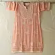 semi stitched viscose georgette kurti in delicate peach color featuring fine hand embroidered chikankari lattice yoke and all over floral motifs paired with a mukaish and lace detailed dupatta