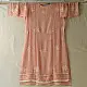 semi stitched viscose georgette kurti in delicate peach color featuring fine hand embroidered chikankari lattice yoke and all over floral motifs paired with a mukaish and lace detailed dupatta