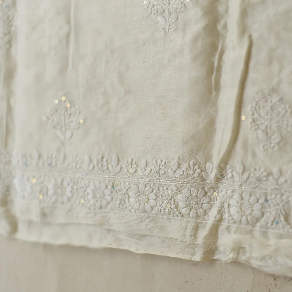 unstitched pure silk chanderi pristine white chikankari kurta fabric with dupatta featuring front back resham hand embroidery and metallic mukaish work highlights