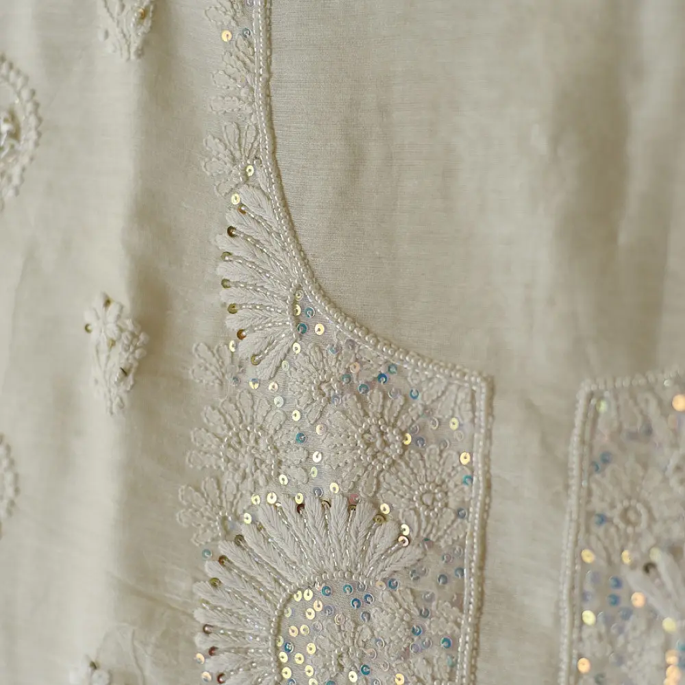 unstitched pure silk chanderi kurti fabric in luminous pearl white featuring hand embroidered chikankari resham work and delicate mukaish highlights   