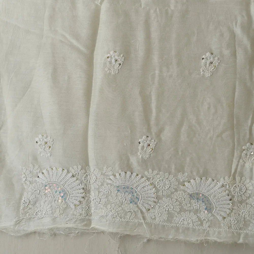 unstitched pure silk chanderi kurti fabric in luminous pearl white featuring hand embroidered chikankari resham work and delicate mukaish highlights   