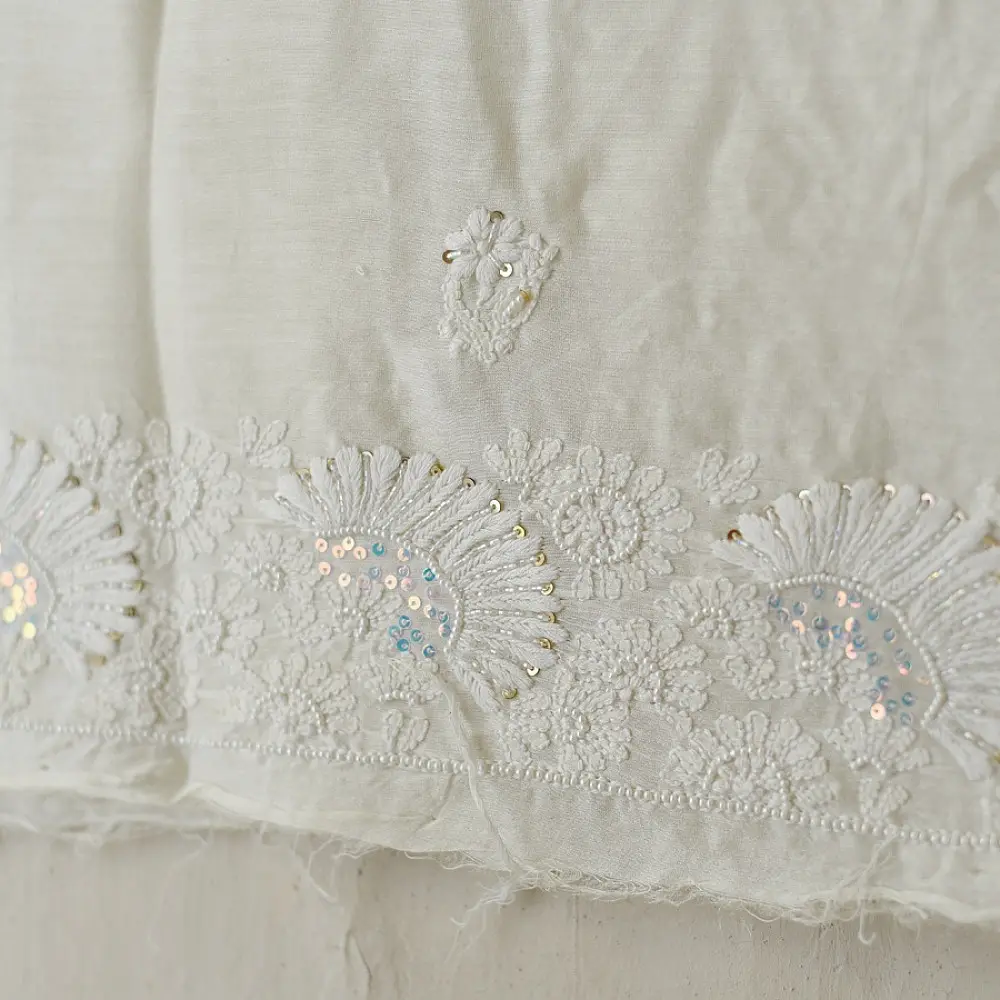 unstitched pure silk chanderi kurti fabric in luminous pearl white featuring hand embroidered chikankari resham work and delicate mukaish highlights   