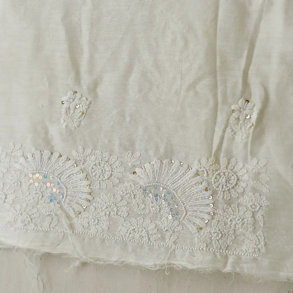 unstitched pure silk chanderi kurti fabric in luminous pearl white featuring hand embroidered chikankari resham work and delicate mukaish highlights   