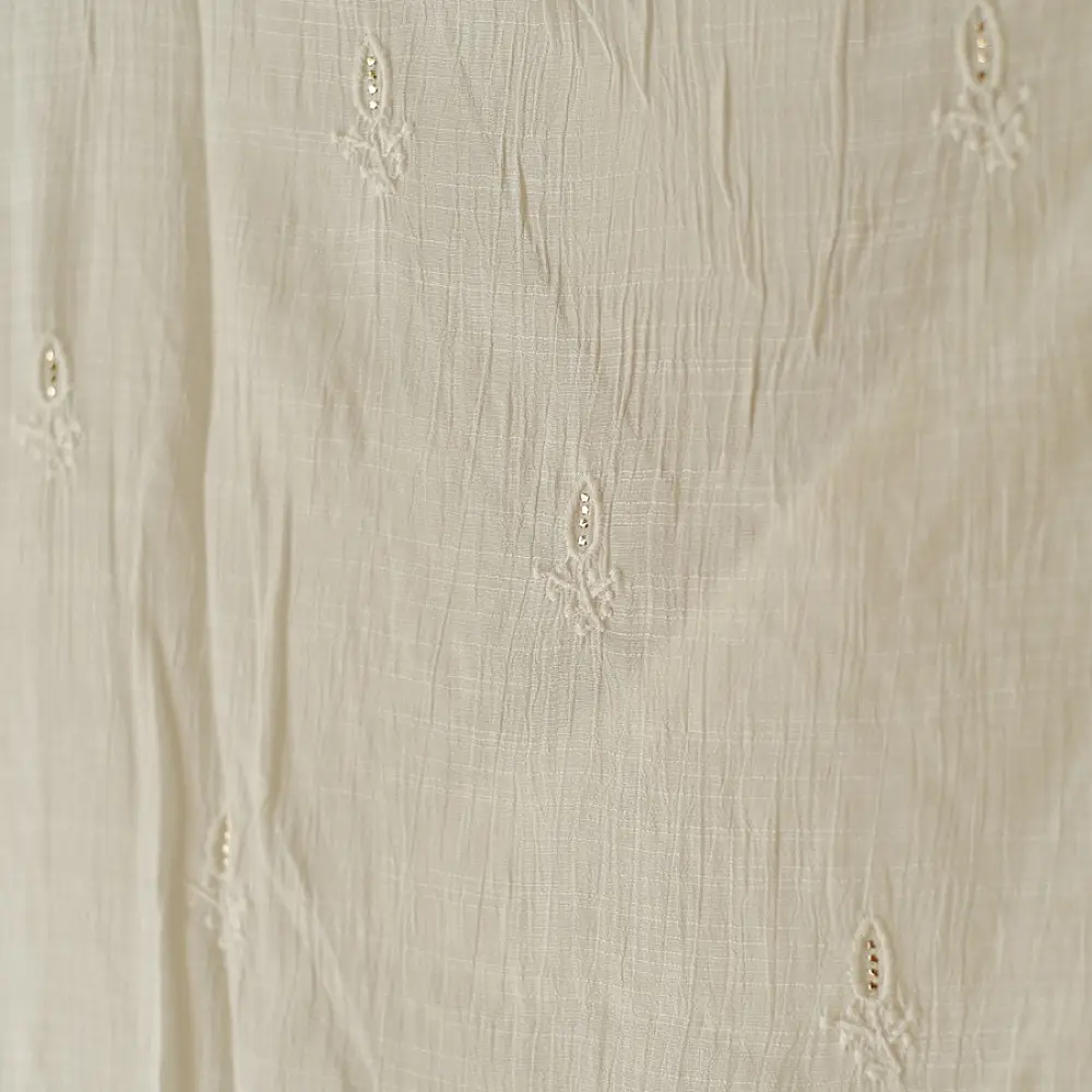 semi stitched viscose slub kurti with elegant embroidery panel design and dupatta with mukaish highlights in ethereal ivory color