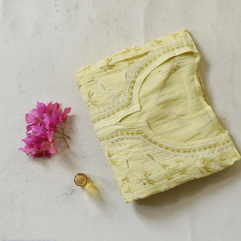 semi stitched pure silk chanderi kurti in bright vasanti yellow with all over chikankari buti embroidery paired with a rich brocade dupatta