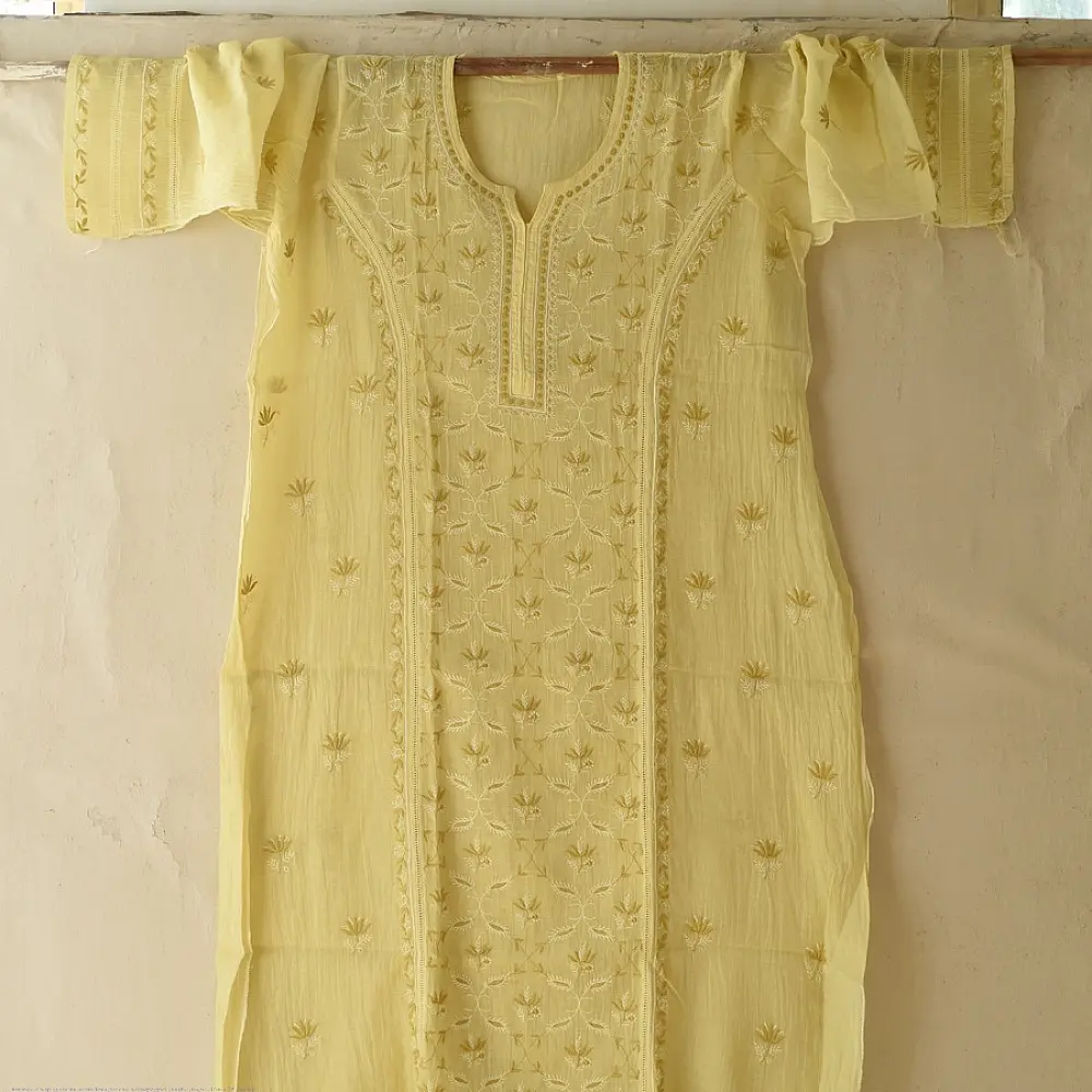semi stitched pure silk chanderi kurti in bright vasanti yellow with all over chikankari buti embroidery paired with a rich brocade dupatta
