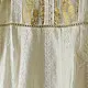 semi stitched pure silk chanderi kurti in off white with intricate hand embroidered resham chikankari and metallic gold brocade yoke and sleeve cuff details