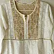 semi stitched pure silk chanderi kurti in off white with intricate hand embroidered resham chikankari and metallic gold brocade yoke and sleeve cuff details