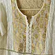 semi stitched pure silk chanderi kurti in off white with intricate hand embroidered resham chikankari and metallic gold brocade yoke and sleeve cuff details